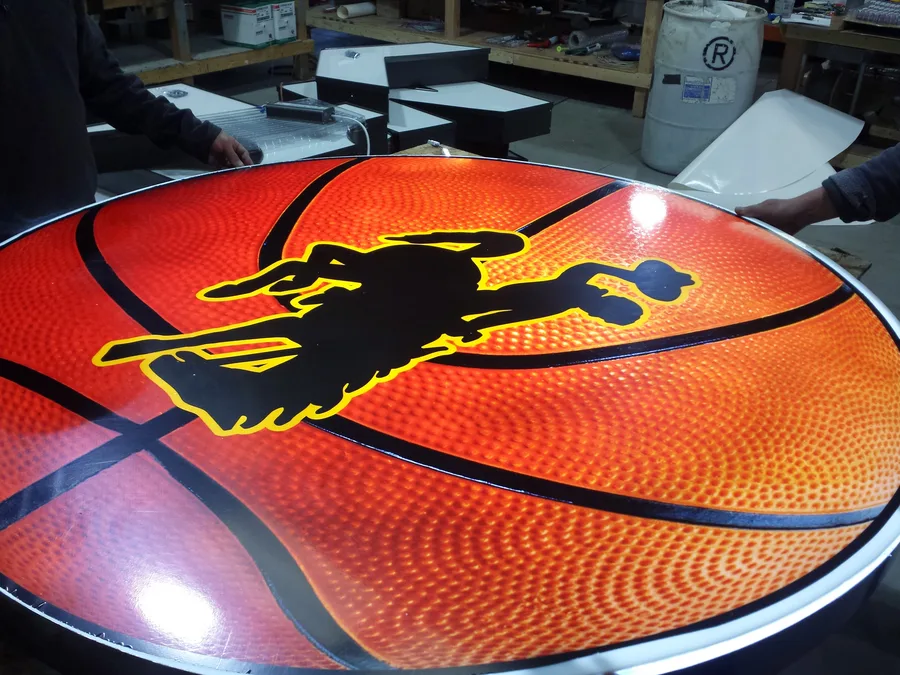 Custom basketball-shaped printed panel with the Wyoming bucking horse