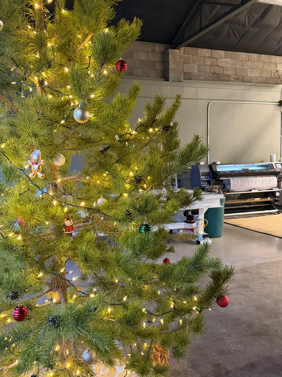 Trade show booth with branded banner displays